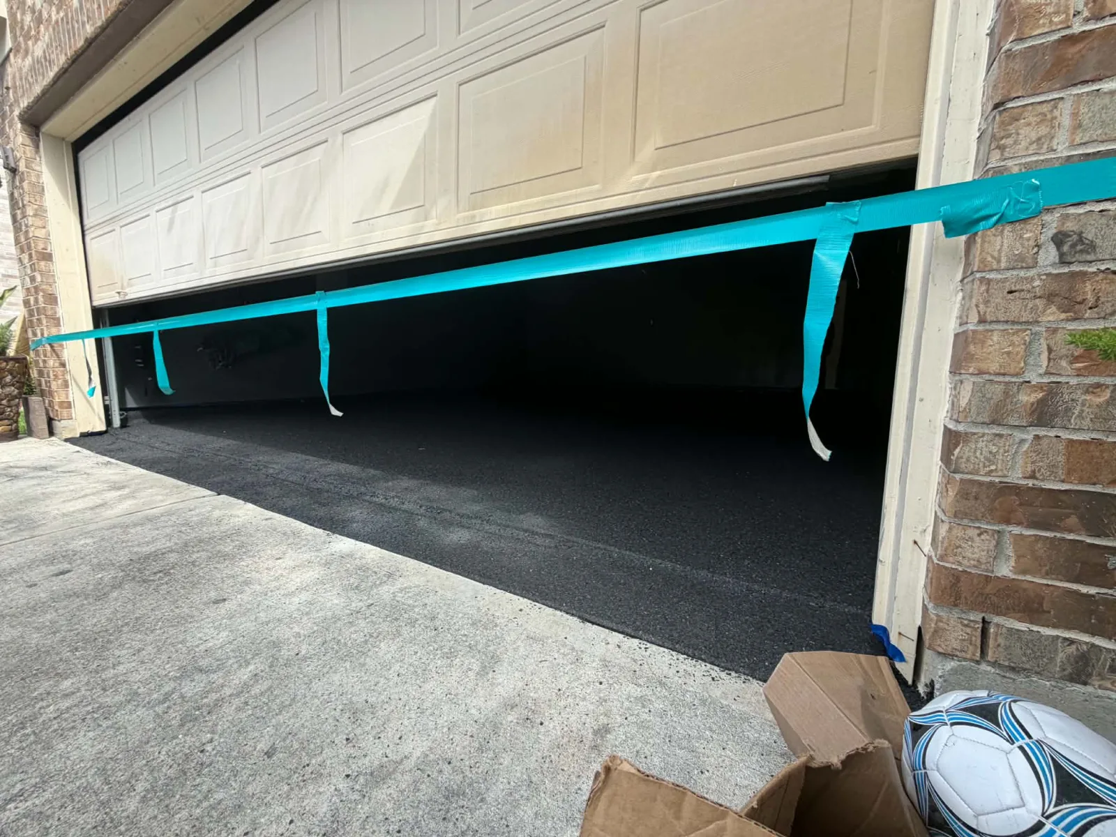 Finished black flake garage floor in Houston